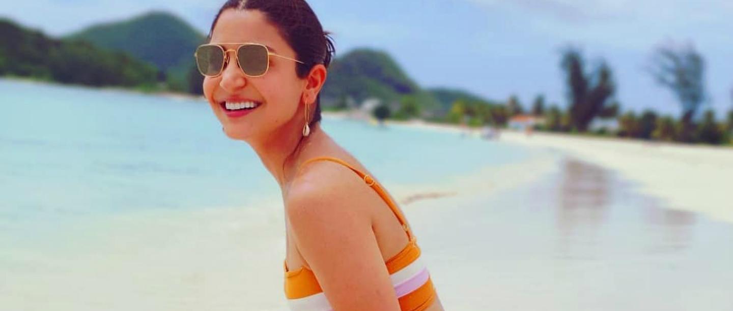 Why So Hot? Anushka Sharma Sizzles By The Beach In An Orange Bikini