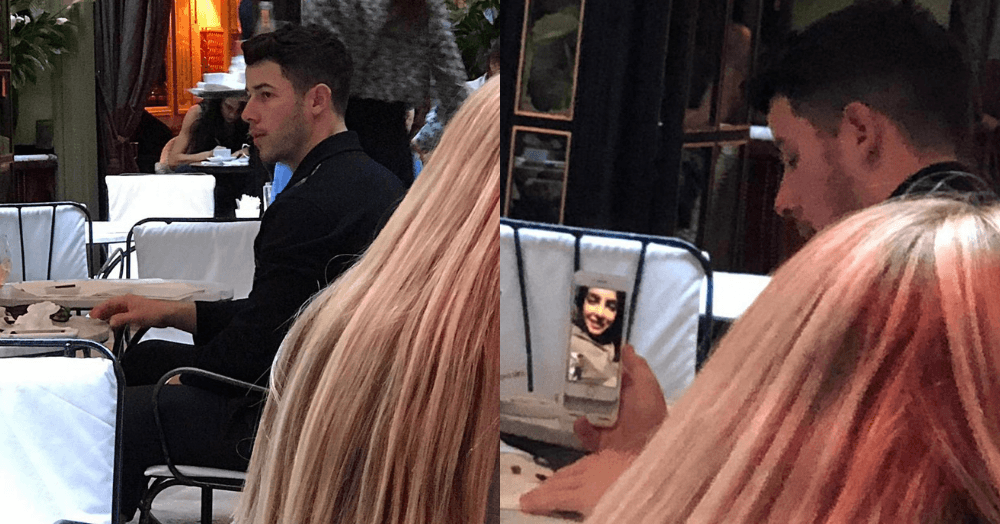 EXCLUSIVELY SPOTTED: Nick Jiju FaceTiming Priyanka At A Restaurant In Paris!
