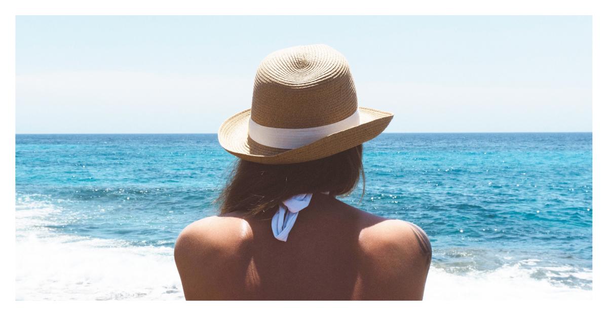 Ciao Bella! This Is What You Need To Avoid Hat Hair This Vacation